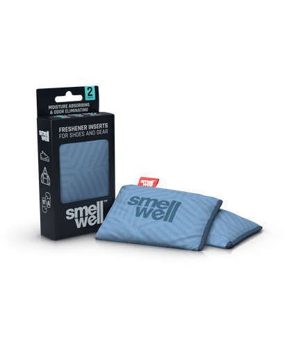 A package of SmellWell Active - Geometric Grey from an angle and 2 SmellWell Active - Geometric Grey freshener inserts bags next to it
