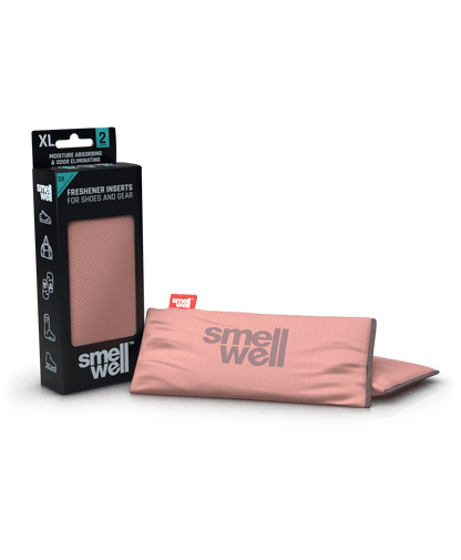 A package of SmellWell Active XL - Blush Pink from an angle and 2 SmellWell Active XL - Blush Pink freshener inserts bags next to it